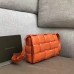 Bottega Veneta Padded Cassette Bag In Orange Calfskin