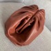 Bottega Veneta The Pouch Clutch In Rust Calfskin