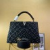 Louis Vuitton Capucines PM Bag In Quilting Lambskin M55366