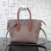 Louis Vuitton Taupe Freedom Bag M54841