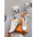 Louis Vuitton Women's White Run Away Sneakers with Gold Details Louis Vuitton Women's White Run Away Sneakers with Gold Details