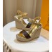 Louis Vuitton Starboard Wedge Sandals in Lambskin and Monogram Canvas Louis Vuitton Starboard Wedge Sandals in Lambskin and Monogram Canvas